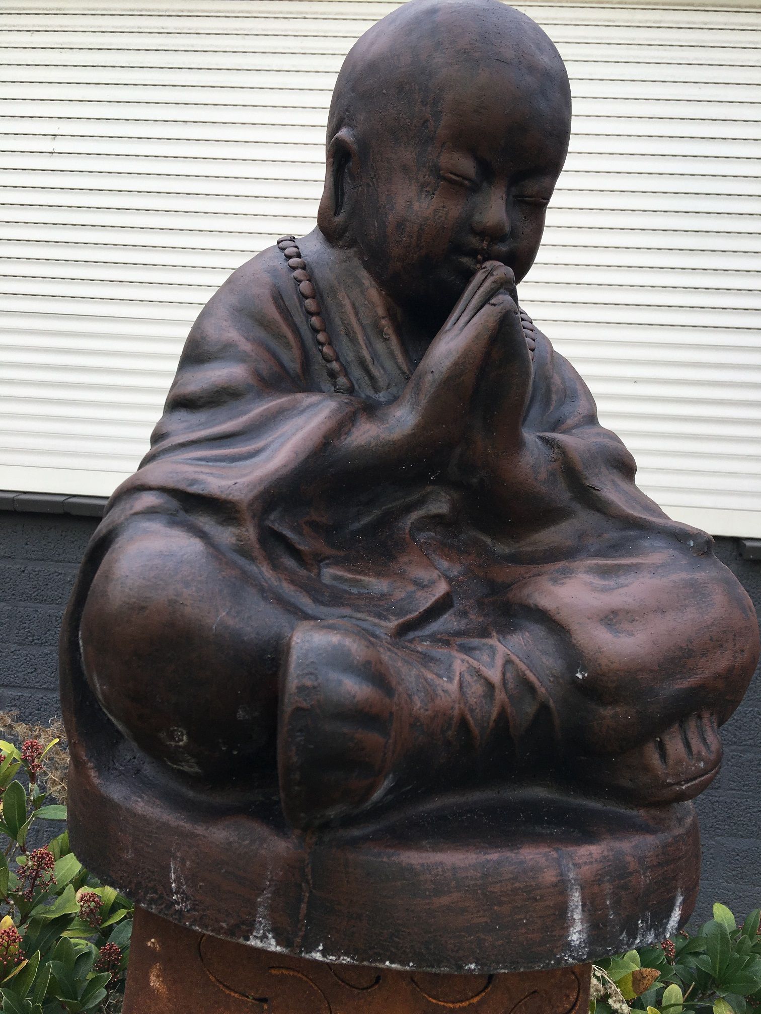 Shaolin Monnik biddend, vol steen .